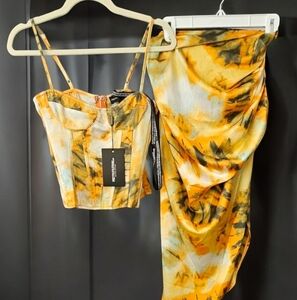 Pretty Little Things Size 2 Corset top with matching Ruched Side Midi Skirt